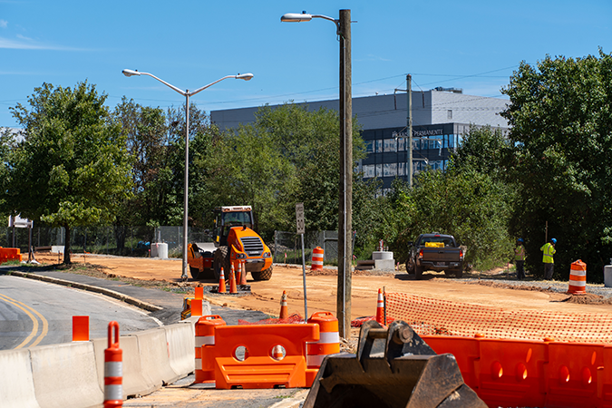 Road with construction cones and equipment