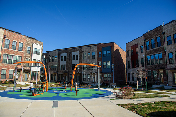 Multi-family housing with playground.