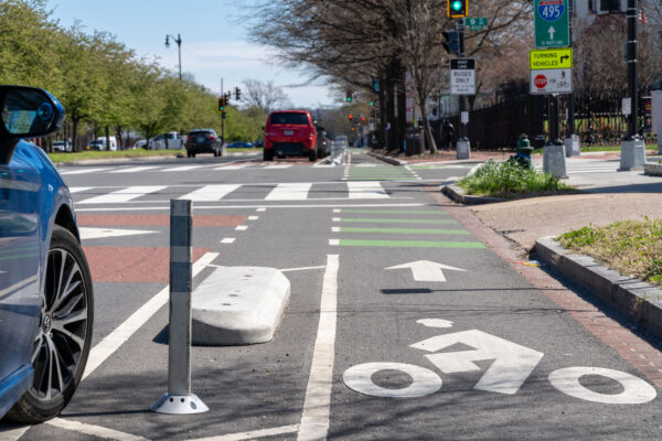 Intersection in Washington DC with bike lane and crosswalk clearly delineated.