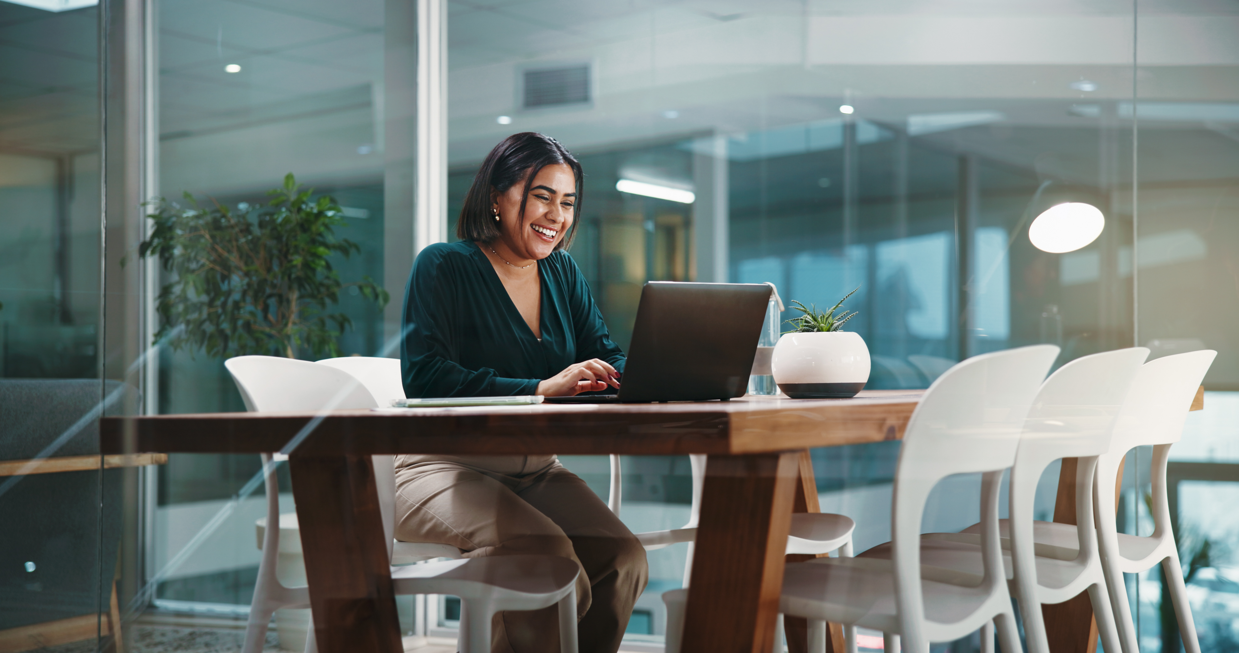 Woman working on a computer. Photo by Jacob Wackerhausen, istockphoto.com.