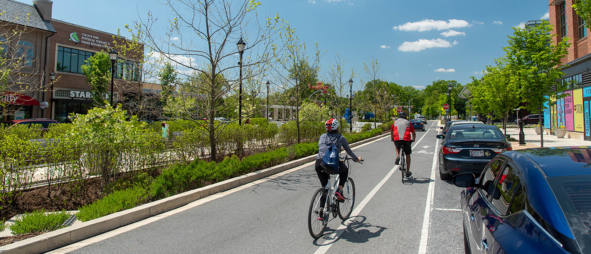 Bicyclists riding bikes in a bike lane in Largo, MD