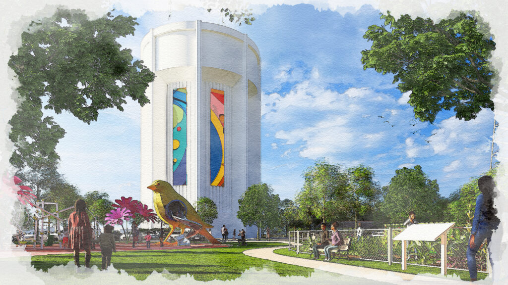 Rendering of a redesigned public space centered around the Suitland Water Tower. The white cylindrical water tower is accented with colorful artistic panels and surrounded by landscaped lawns, mature trees, walking paths, interpretive displays, and seating areas. A large bird sculpture serves as a focal point within the park, while visitors walk, gather, and enjoy the outdoor environment. The scene highlights the site's transformation into a community destination that combines public art, recreation, and green space.
