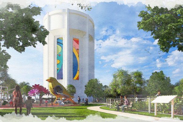 Rendering of a redesigned public space centered around the Suitland Water Tower. The white cylindrical water tower is accented with colorful artistic panels and surrounded by landscaped lawns, mature trees, walking paths, interpretive displays, and seating areas. A large bird sculpture serves as a focal point within the park, while visitors walk, gather, and enjoy the outdoor environment. The scene highlights the site's transformation into a community destination that combines public art, recreation, and green space.